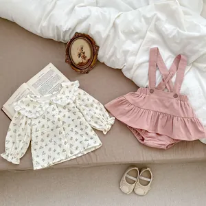 Infant floral long sleeve shirt and pink suspender skirt set for spring baby girls