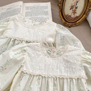 Floral baby girl long sleeve romper with vintage lace trim and pastoral print