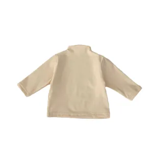 Minimalist beige long sleeve stretch base layer t-shirt with semi-high collar for toddlers