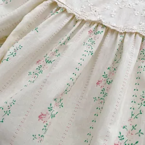 Pastoral style floral baby romper in beige cotton with rose print and lace embroidery