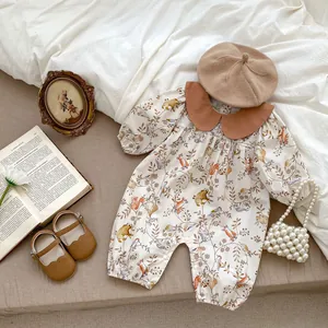 Cute animal print baby romper with a brown Peter Pan collar and matching vintage accessories