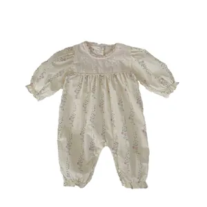 Floral baby girl long sleeve romper with white lace collar and cotton fabric