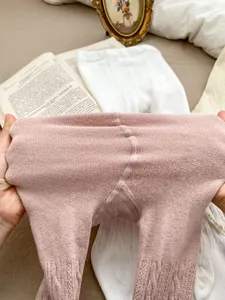 Gerippte Baby-Strumpfhosen mit Perlen-Schleife in Altrosa für Mädchen im Frühling