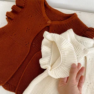 Knitted baby vest with ruffle sleeves in caramel brown and cream white colors