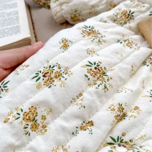 Thickened winter baby floral romper with quilted cotton fabric and warm bow detail