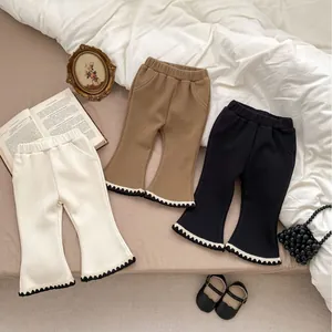 Girls ribbed flare pants with lace trim in cream brown and black colors for winter