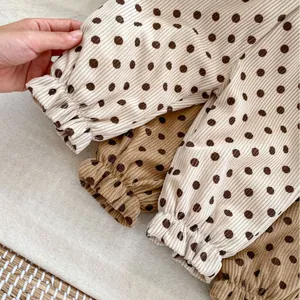 Kids corduroy polka dot trousers in beige and brown with warm fleece lining