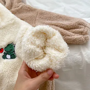 Cozy baby hooded romper in thick sherpa fleece with cute dinosaur embroidery for winter