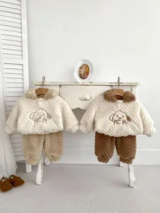 Detailed view of winter baby fleece sets with cute cartoon puppy embroidery and diamond pattern