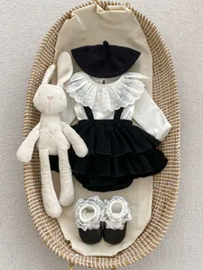 Infant girl vintage white lace collar top with black tiered suspender shorts and hat