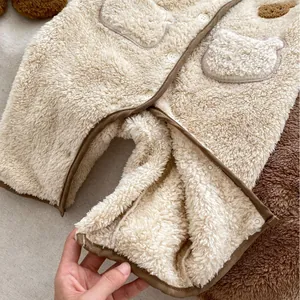 Tutina invernale neonato in pile con tasca a testa di orso e lana di agnello calda