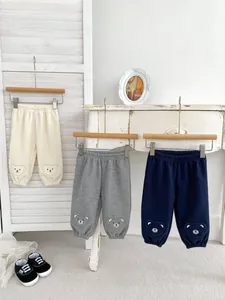 Detailed waffle texture of toddler jogger pants with cute bear embroidery on cuffs