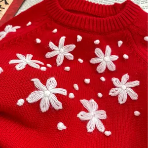 Red baby knitted romper with handmade white 3D flower embroidery for spring festival