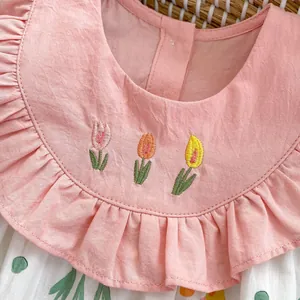 Barboteuse bébé fille rose avec broderie tulipe et col volanté pour l'été