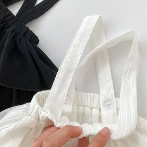 Elastic waist ruffled baby girl strap dress in wrinkled fabric with button details