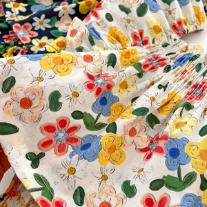 Baby girl summer floral tank top with elastic smocking detail and daisy print