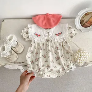 Floral baby romper with large ruffled collar and fine red flower embroidery