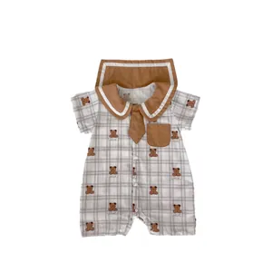 Short sleeve baby romper with brown bear print and navy collar in grey plaid fabric