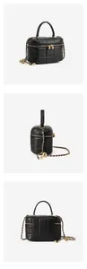 Detailed views of black quilted leather box bag with gold chain and spherical pendant