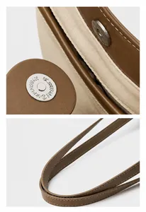 Close-up of premium brown leather texture with durable magnetic metal hardware buckle