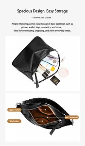 Struttura interna della borsa tote in pelle nera con scomparto principale e tasche zip