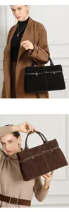 Detail showing high-quality suede texture and leather handle of large tote bag