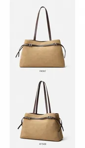 Front and 45-degree side views of apricot suede tote bag with brown leather straps