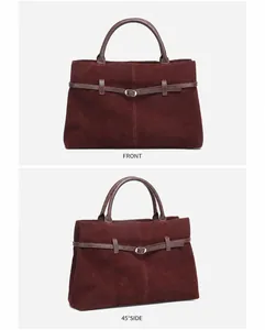 Detail view of wine red matte leather tote bag showing front and side perspectives