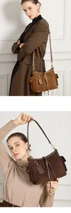 Dettaglio della borsa tote in pelle scamosciata con tasche laterali e nappe in pelle