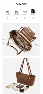 Detailed internal compartments of a brown leather tote bag showing high capacity storage