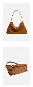 Detailansicht der braunen matten Ledertasche mit Rückseite und Boden mit Metallbolzen