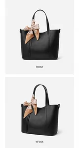 Vistas detalladas frontal y lateral de un bolso tote de cuero negro con pañuelo seda