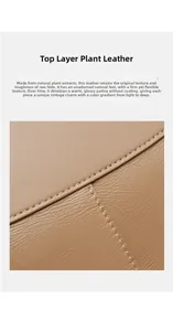 Detailed view of veg-tan top grain leather texture and fine stitching on a brown tote