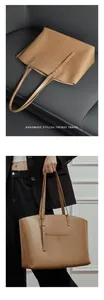 Detail of vegetable tanned leather tote bag with vertical stitching and shoulder straps
