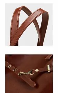 Detail of dark brown leather texture with vintage metal buckle and sturdy D-ring hardware