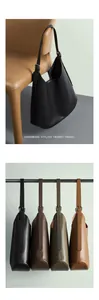 Minimalist leather tote bag with wide adjustable shoulder strap in multiple colors