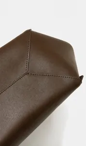 Detail shot of the bottom stitching design on the vintage leather tote bag