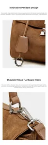 Detail of silver hardware clasp and leather tag on a brown suede tote bag