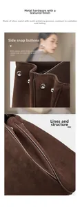 Macro shot of silver metal buckles and suede texture on a large brown tote bag