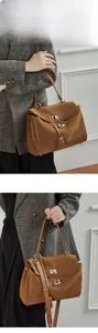 Brown matte suede tote bag with silver turn-lock clasp shown as shoulder and handbag styles