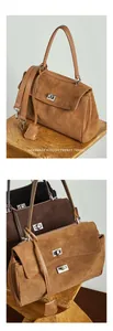 Detailed view of matte suede leather tote bag featuring a silver swivel lock and handle