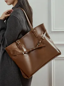 Retro brown leather tote bag with large capacity and buckle detail for women