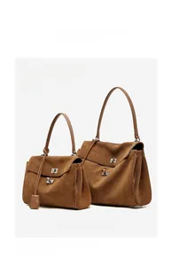 Size comparison of large and small brown suede leather tote bags with metal turn-lock