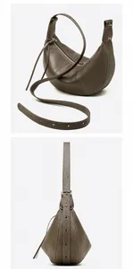 Detail of tan lychee grain leather handbag featuring contrast stitching and side view