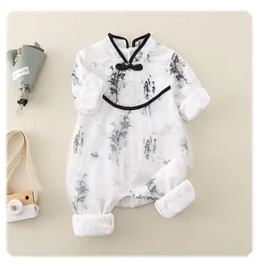 Macro detail of Chinese style baby romper with bamboo print and traditional frog buttons