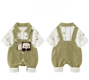 Detailed front and back view of baby panda print shirt and green knit overalls