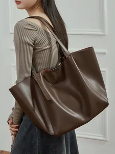 Large capacity dark brown leather tote bag with vertical stripes for elegant commuting
