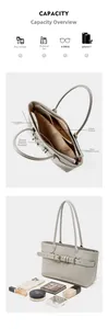 Detail view of large grey leather tote bag interior with multiple functional pockets