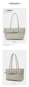 Front and 45-degree side view of a gray leather tote bag with a decorative gold buckle