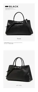 Vue détaillée de face et de côté du sac baguette en cuir noir avec boucle métallique